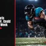 Jacksonville Jaguars running back Chris Rodriguez Jr. carrying the ball in a stadium during an NFL game